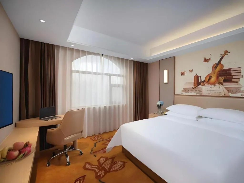 Bed in Vienna Hotel Nanchang Wanli