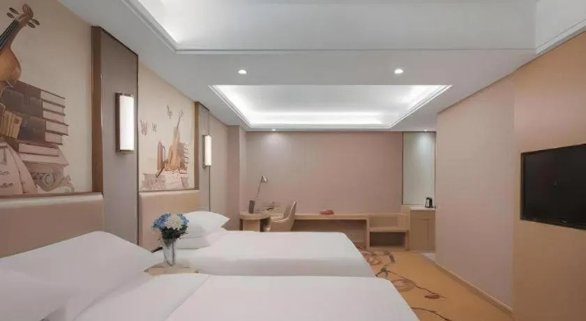 Bed in Vienna Hotel Nanchang Wanli