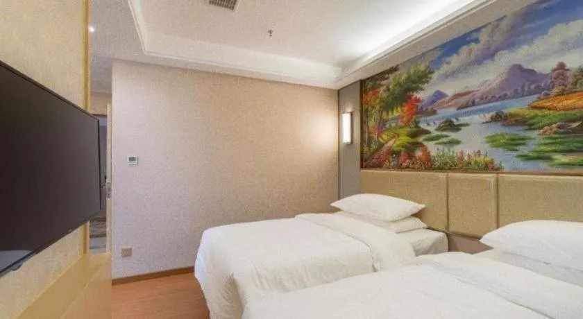 Bed in Vienna Hotel Nanchang Wanli
