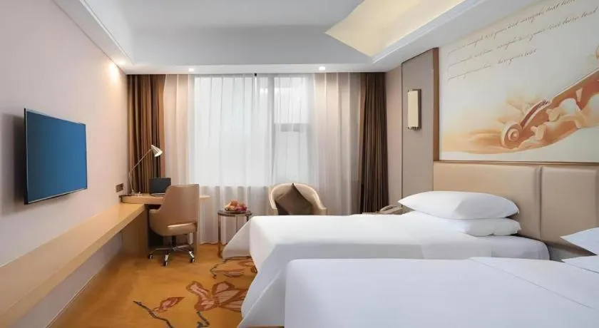 Bed in Vienna Hotel Nanchang Wanli
