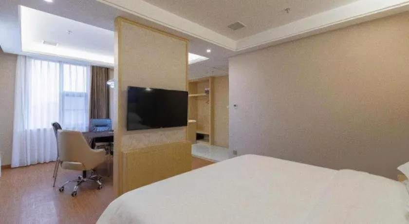 Bed in Vienna Hotel Nanchang Wanli