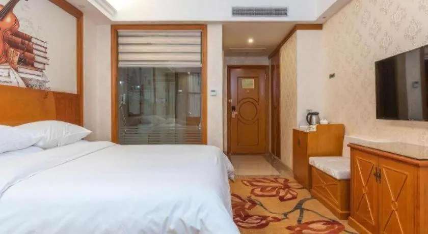 Bed in Vienna Hotel Hunan Shaoyang South Railway Station