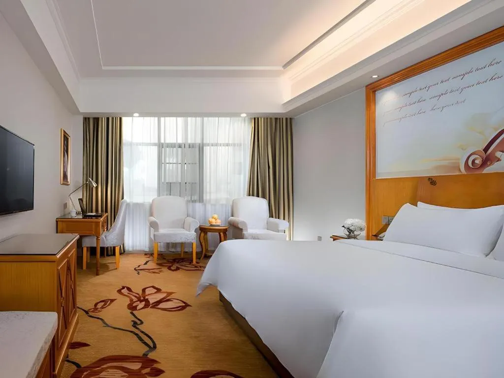 Bed in Vienna Hotel Hunan Shaoyang South Railway Station