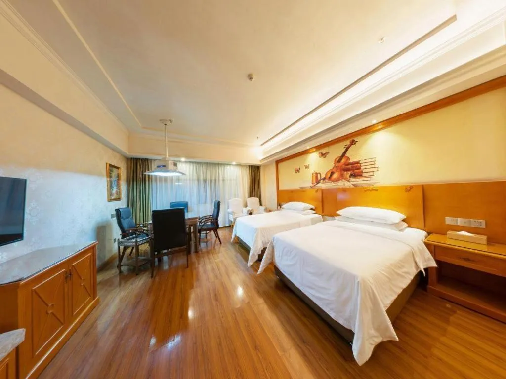 Bed in Vienna Hotel Hunan Shaoyang South Railway Station