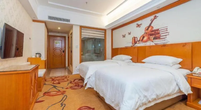 Bed in Vienna Hotel Hunan Shaoyang South Railway Station