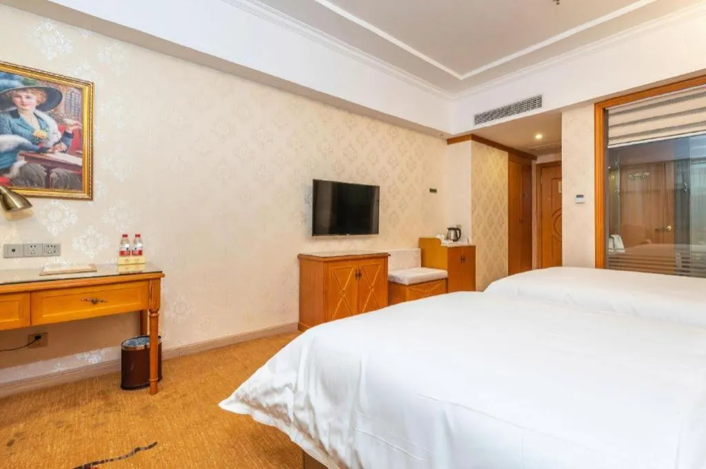 Bed in Vienna Hotel Hunan Shaoyang South Railway Station