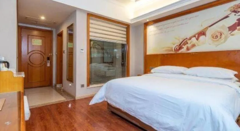 Bed in Vienna Hotel Hunan Shaoyang South Railway Station