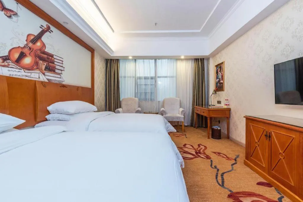 Bed in Vienna Hotel Hunan Shaoyang South Railway Station