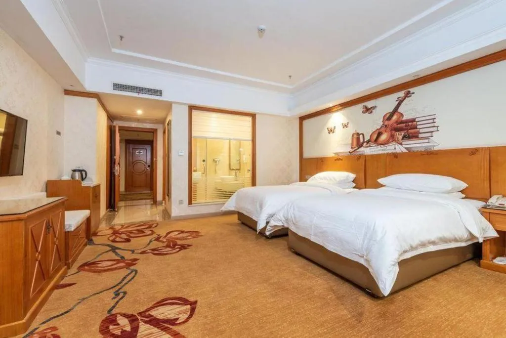 Bed in Vienna Hotel Hunan Shaoyang South Railway Station