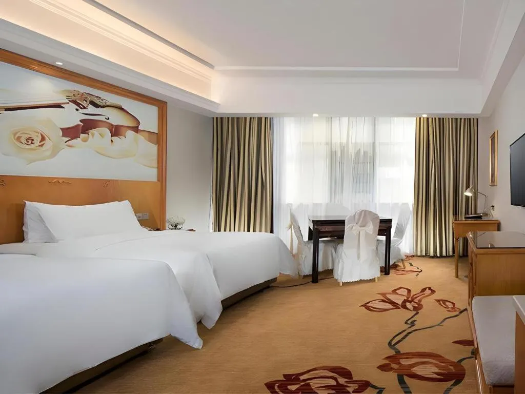 Bed in Vienna Hotel Hunan Shaoyang South Railway Station