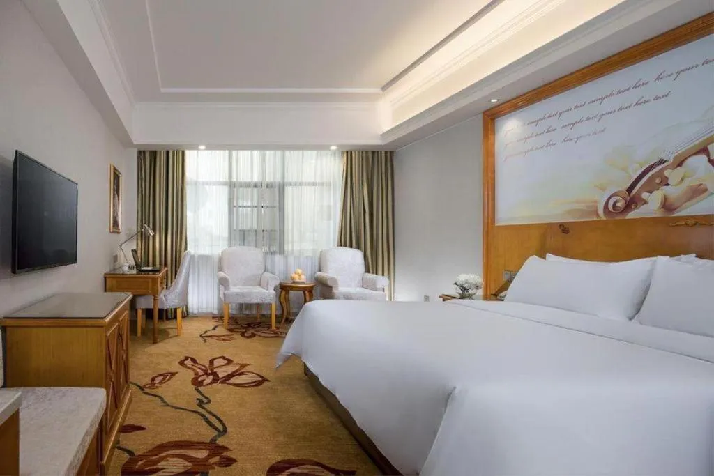 Bed in Vienna Hotel Hunan Shaoyang South Railway Station