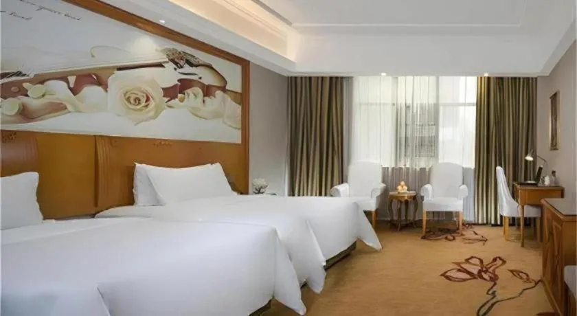 Bed in Vienna Hotel Hunan Shaoyang South Railway Station