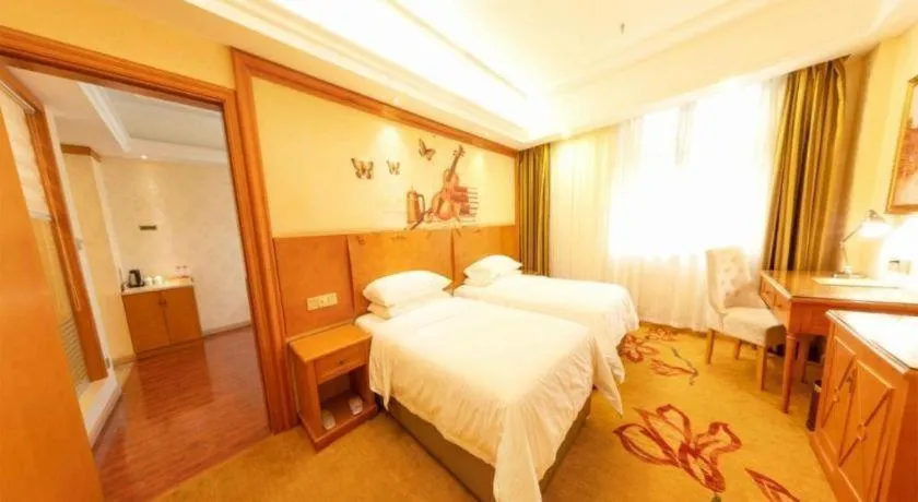 Bed in Vienna Hotel Hunan Shaoyang South Railway Station