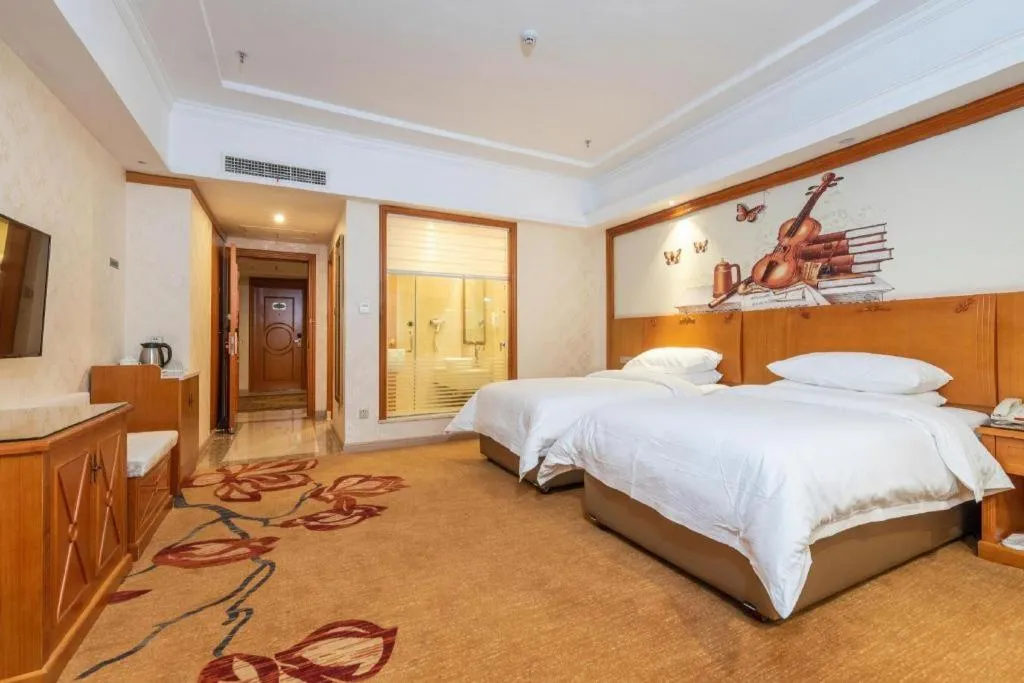 Bed in Vienna Hotel Hunan Shaoyang South Railway Station