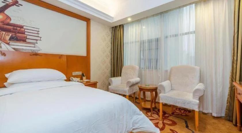 Bed in Vienna Hotel Hunan Shaoyang South Railway Station