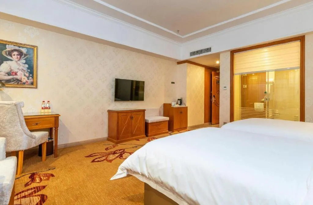 Bed in Vienna Hotel Hunan Shaoyang South Railway Station