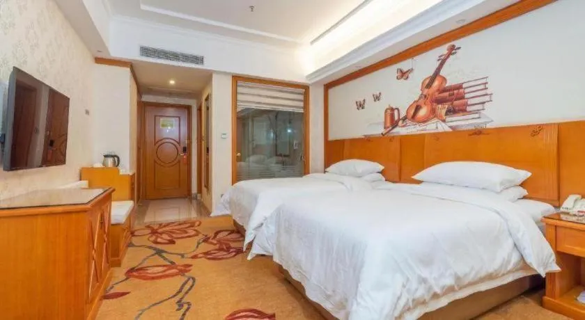 Bed in Vienna Hotel Hunan Shaoyang South Railway Station