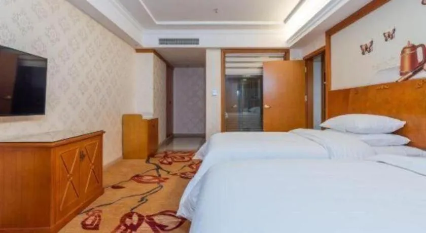 Bed in Vienna Hotel Hunan Shaoyang South Railway Station