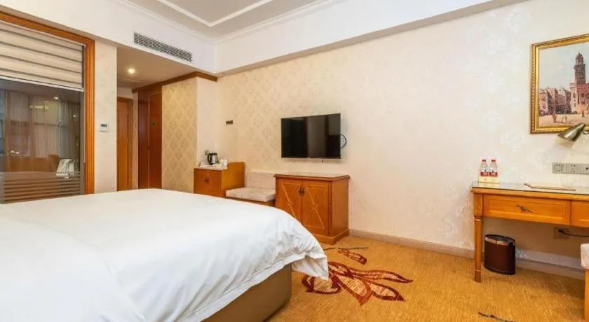 Bed in Vienna Hotel Hunan Shaoyang South Railway Station