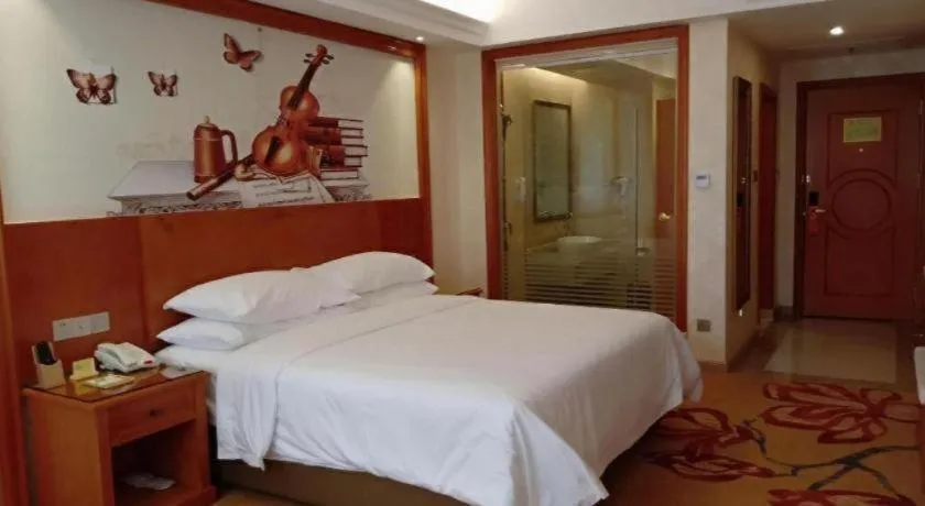 Bed in Vienna Hotel Hunan Shaoyang South Railway Station