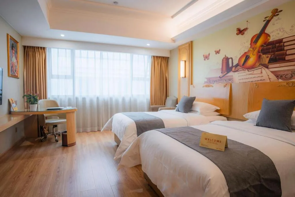 Bed in Vienna Hotel Chongqing Jiefangbei Hongyadong