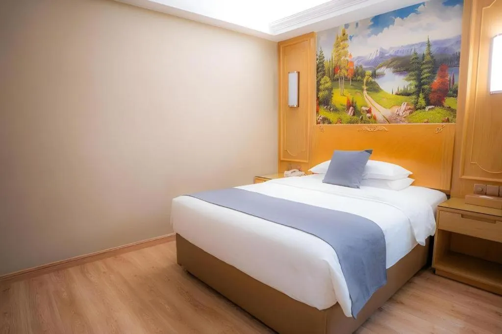 Bed in Vienna Hotel Chongqing Jiefangbei Hongyadong