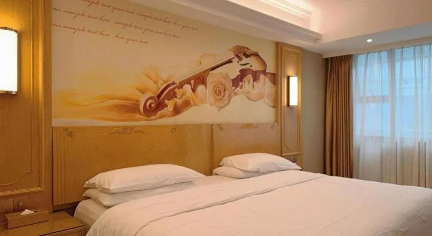 Bed in Vienna Hotel Chongqing Jiefangbei Hongyadong