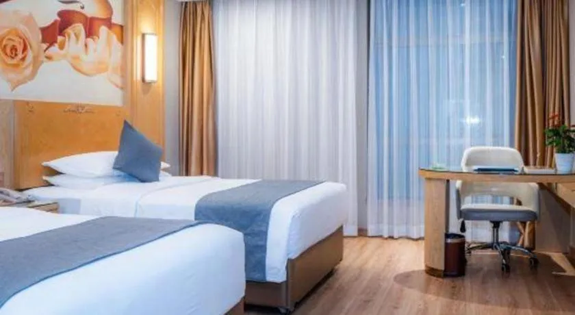 Bed in Vienna Hotel Chongqing Jiefangbei Hongyadong