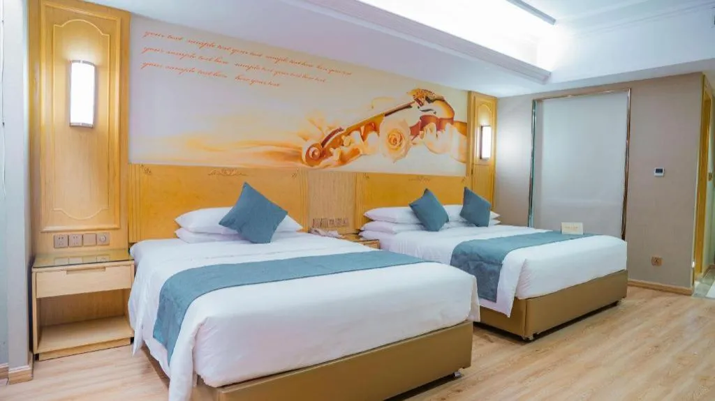 Bed in Vienna Hotel Chongqing Jiefangbei Hongyadong