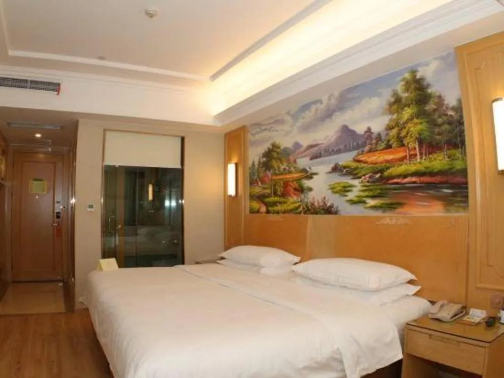 Bed in Vienna Hotel Chongqing Jiefangbei Hongyadong