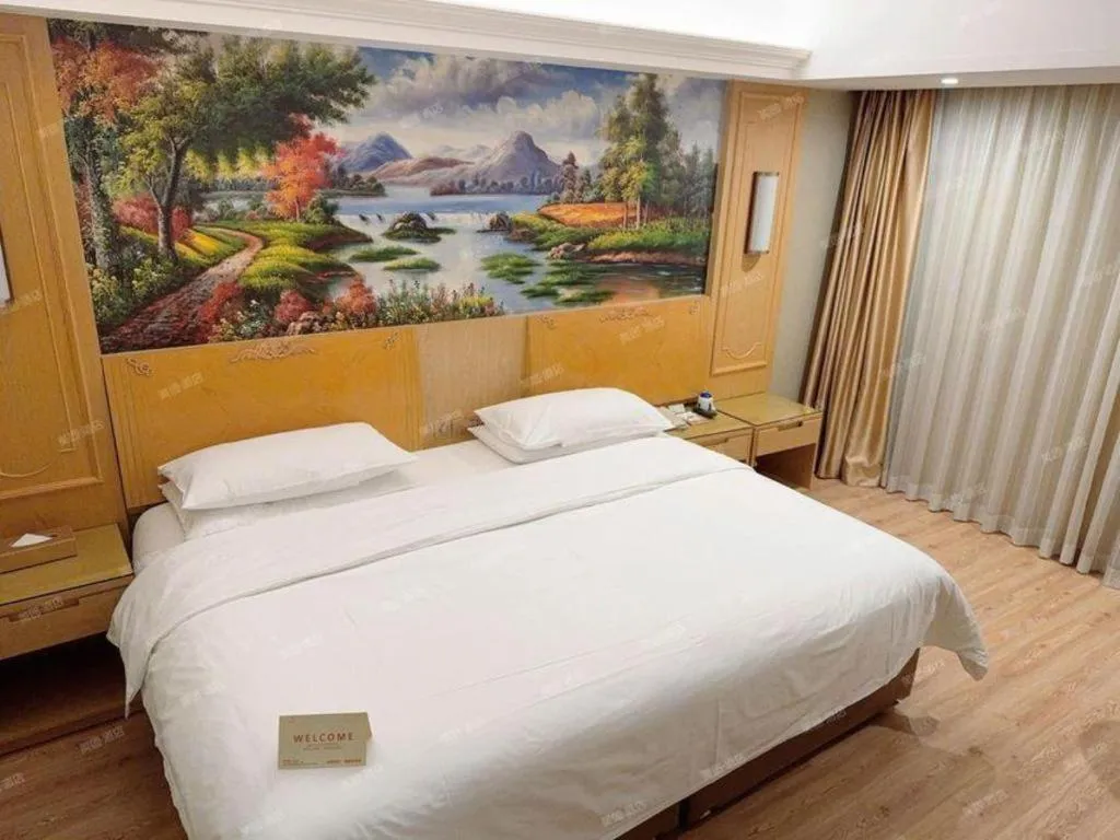 Bed in Vienna Hotel Chongqing Jiefangbei Hongyadong