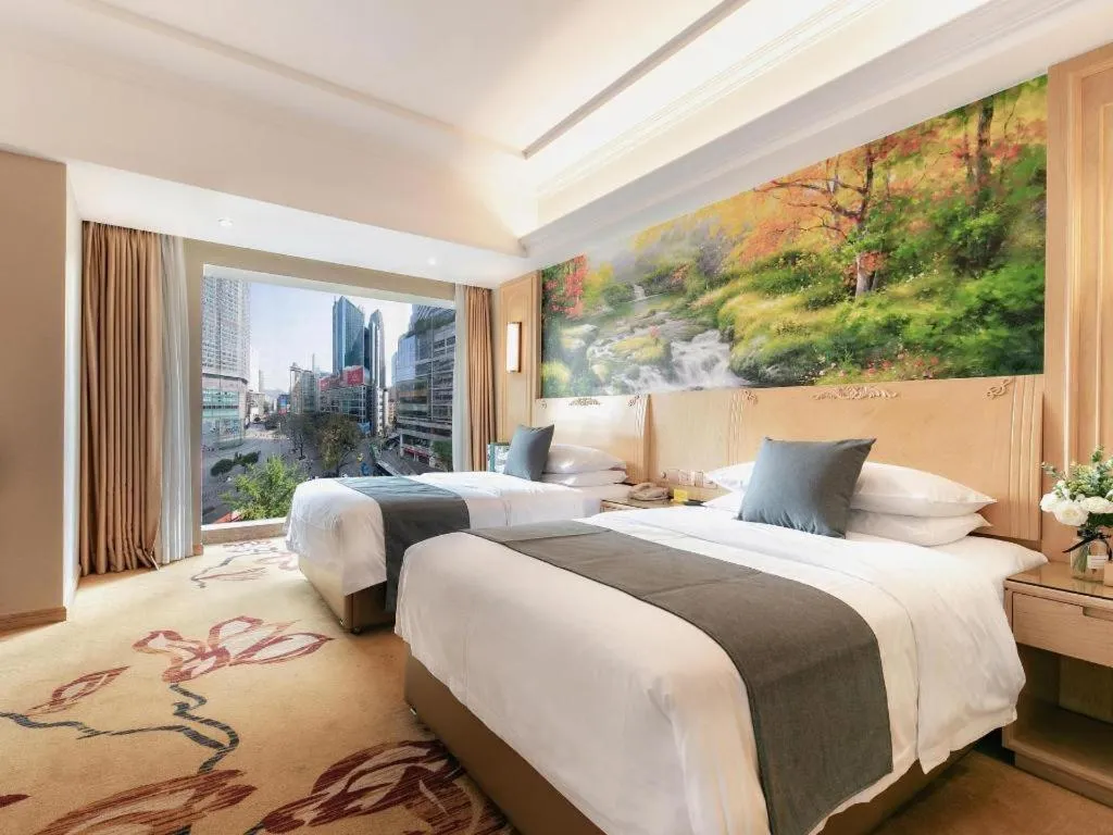 Bed in Vienna Hotel Chongqing Jiefangbei Hongyadong