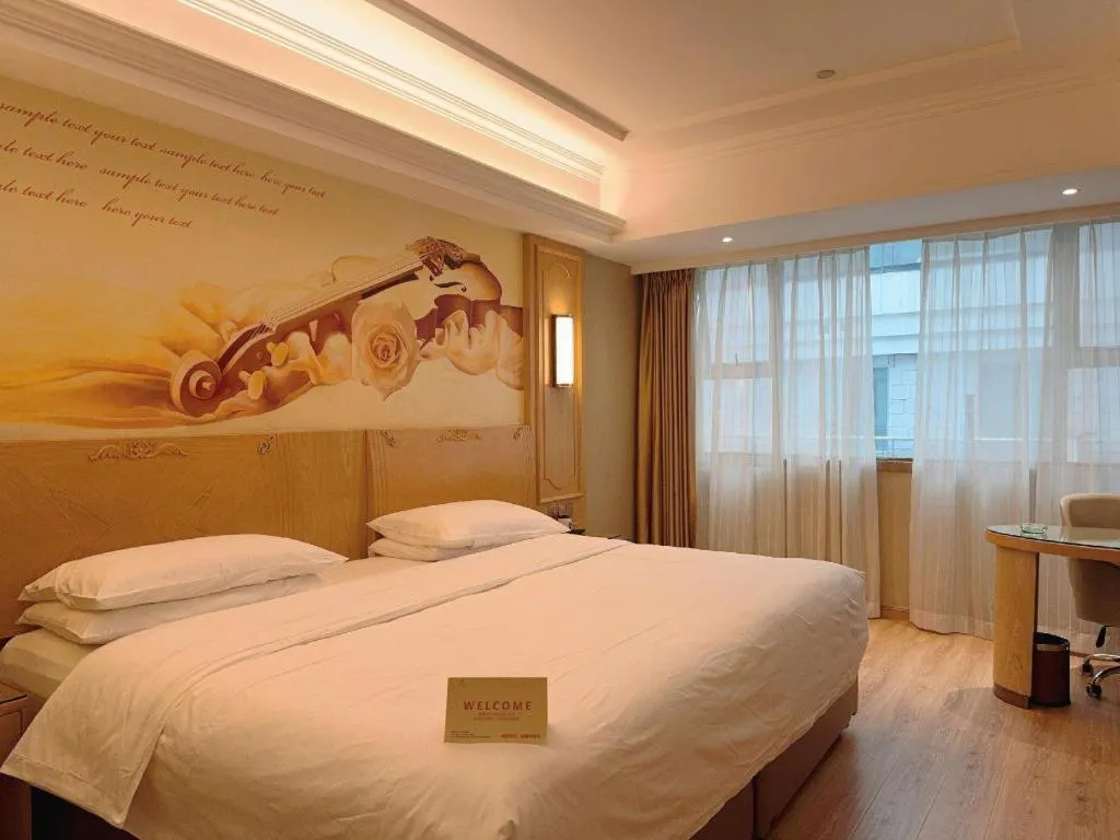 Bed in Vienna Hotel Chongqing Jiefangbei Hongyadong