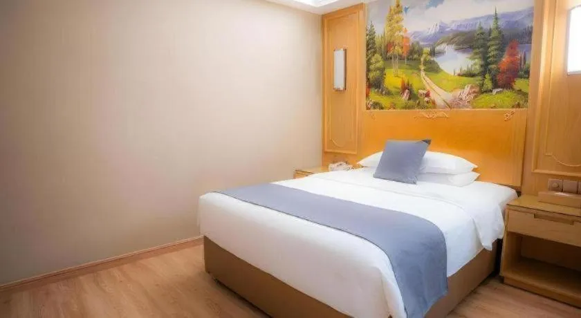 Bed in Vienna Hotel Chongqing Jiefangbei Hongyadong