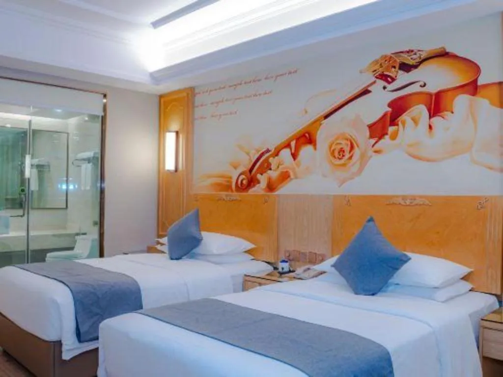 Bed in Vienna Hotel Chongqing Jiefangbei Hongyadong