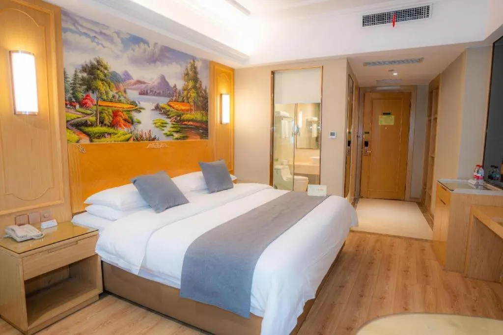 Bed in Vienna Hotel Chongqing Jiefangbei Hongyadong