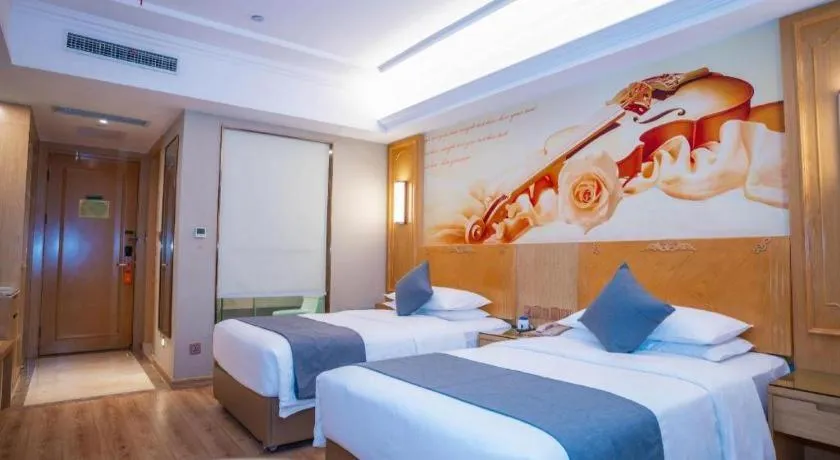 Bed in Vienna Hotel Chongqing Jiefangbei Hongyadong