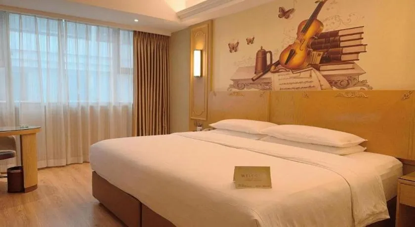 Bed in Vienna Hotel Chongqing Jiefangbei Hongyadong