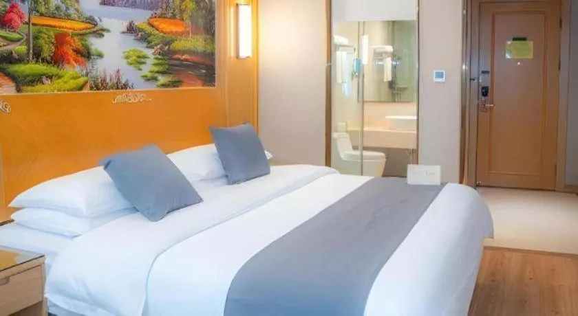 Bed in Vienna Hotel Chongqing Jiefangbei Hongyadong