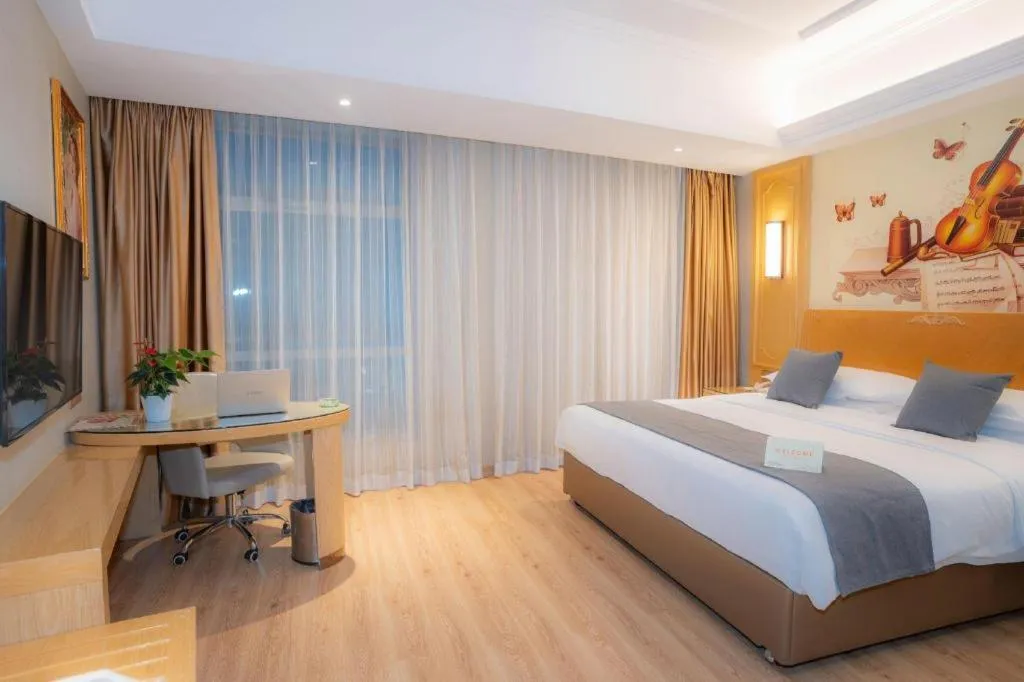 Bed in Vienna Hotel Chongqing Jiefangbei Hongyadong