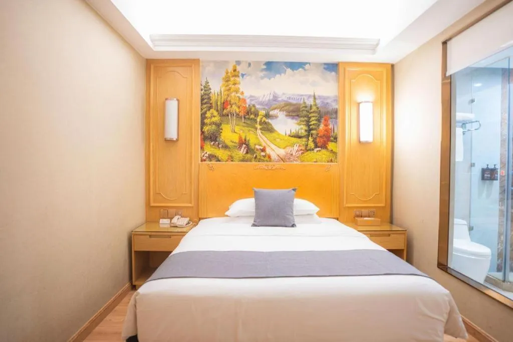 Bed in Vienna Hotel Chongqing Jiefangbei Hongyadong