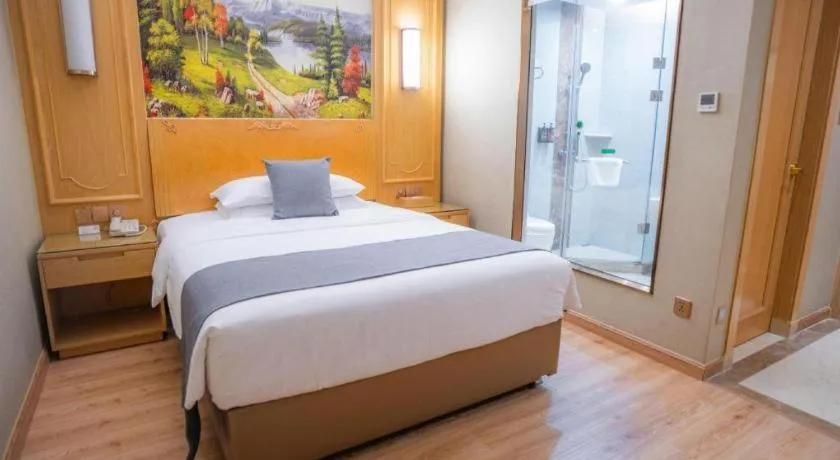 Bed in Vienna Hotel Chongqing Jiefangbei Hongyadong