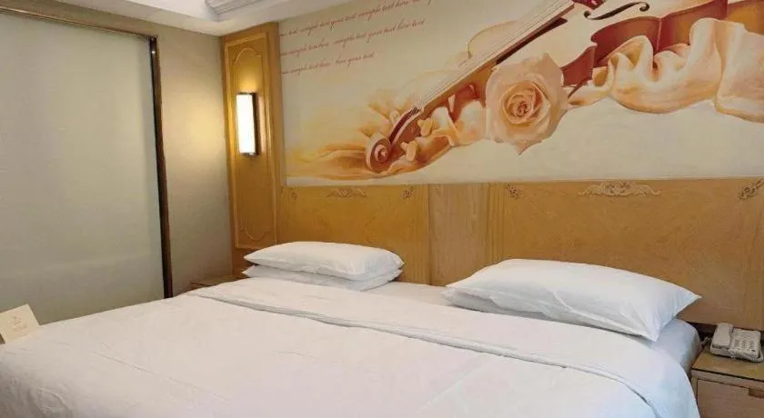 Bed in Vienna Hotel Chongqing Jiefangbei Hongyadong