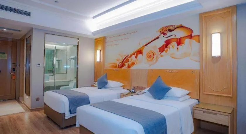 Bed in Vienna Hotel Chongqing Jiefangbei Hongyadong