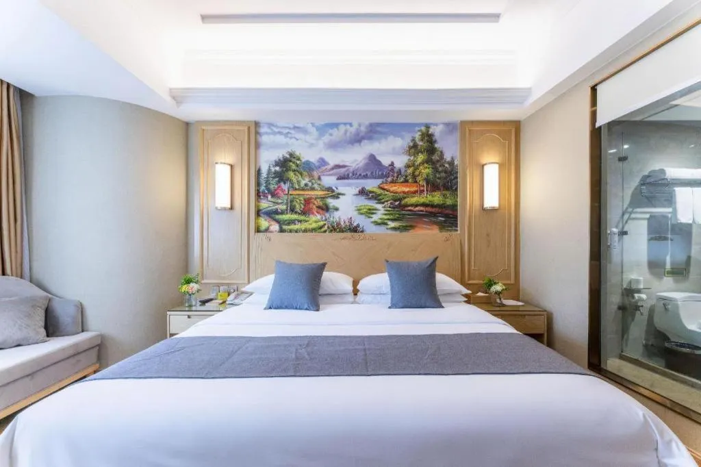 Bed in Vienna Hotel Chongqing Jiefangbei Hongyadong