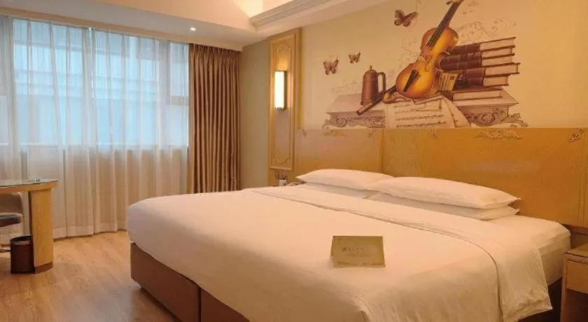 Bed in Vienna Hotel Chongqing Jiefangbei Hongyadong