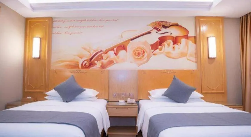 Bed in Vienna Hotel Chongqing Jiefangbei Hongyadong