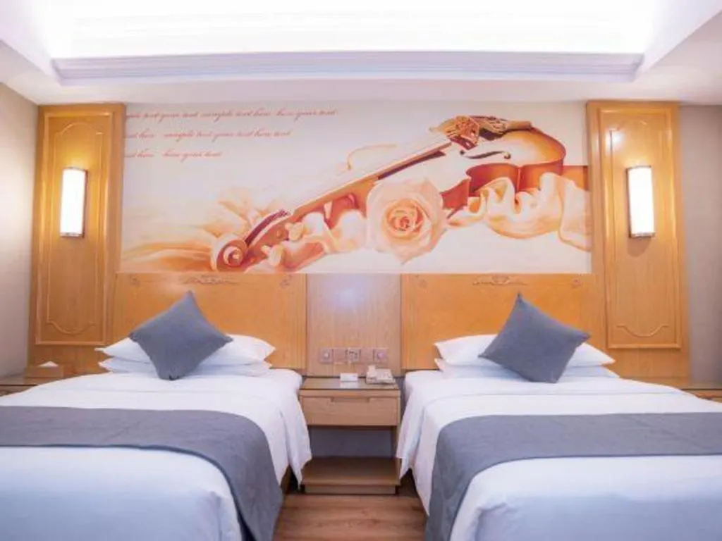 Bed in Vienna Hotel Chongqing Jiefangbei Hongyadong