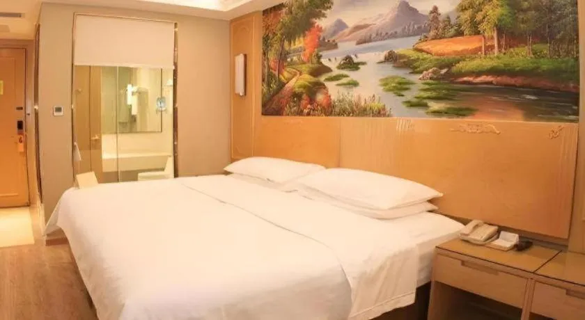 Bed in Vienna Hotel Chongqing Jiefangbei Hongyadong