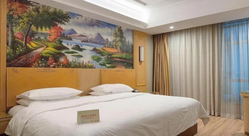 Bed in Vienna Hotel Chongqing Jiefangbei Hongyadong